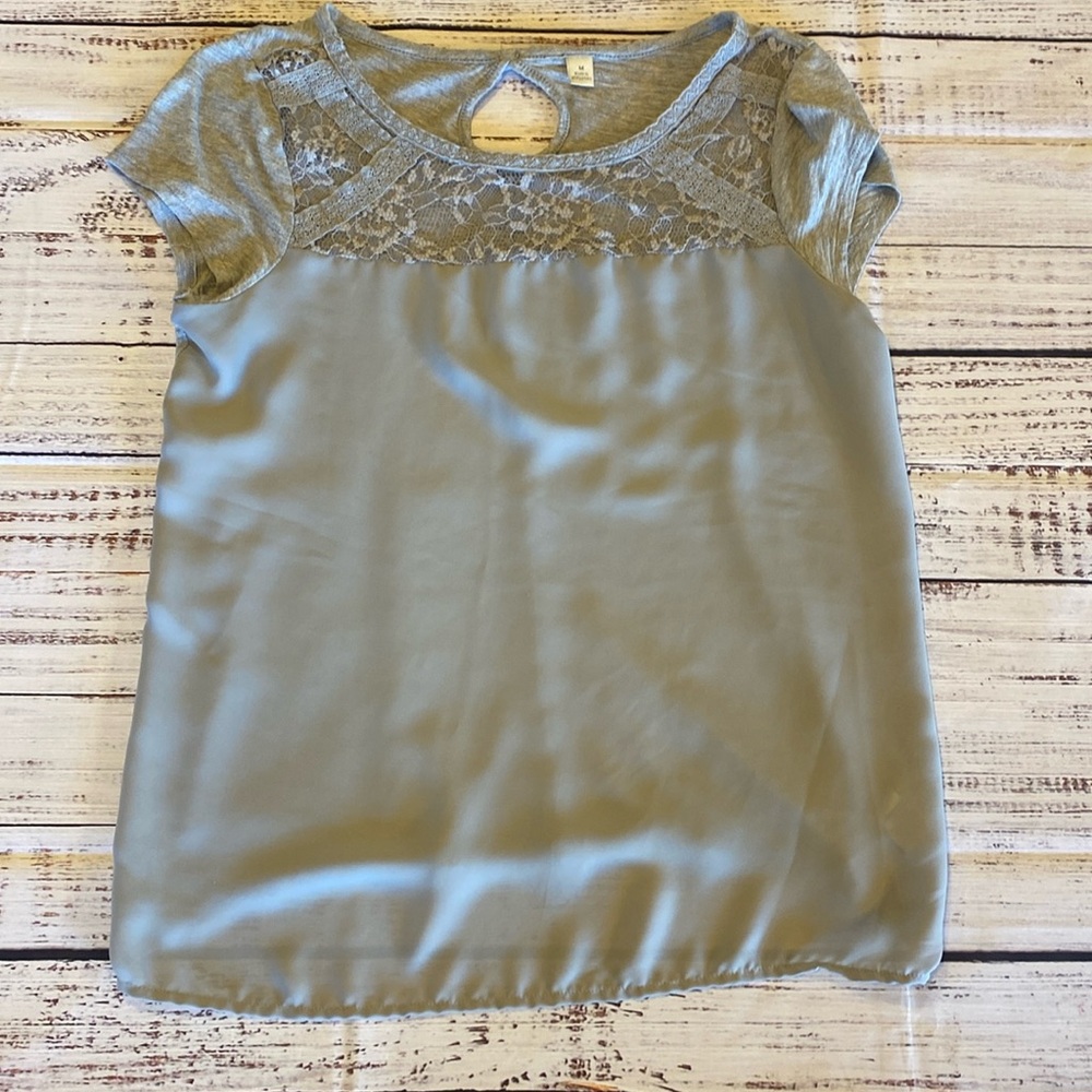 LC Lauren Conrad gray top with lace details. Size medium.